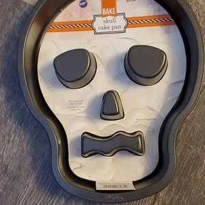 Wilton Skull & easter egg cake pan & cookie sticks